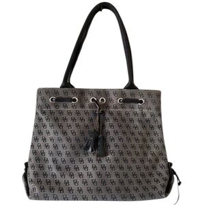 Dooney & Bourke Black & gray monogram Tote w/ silver hardware. Tassel detailing
